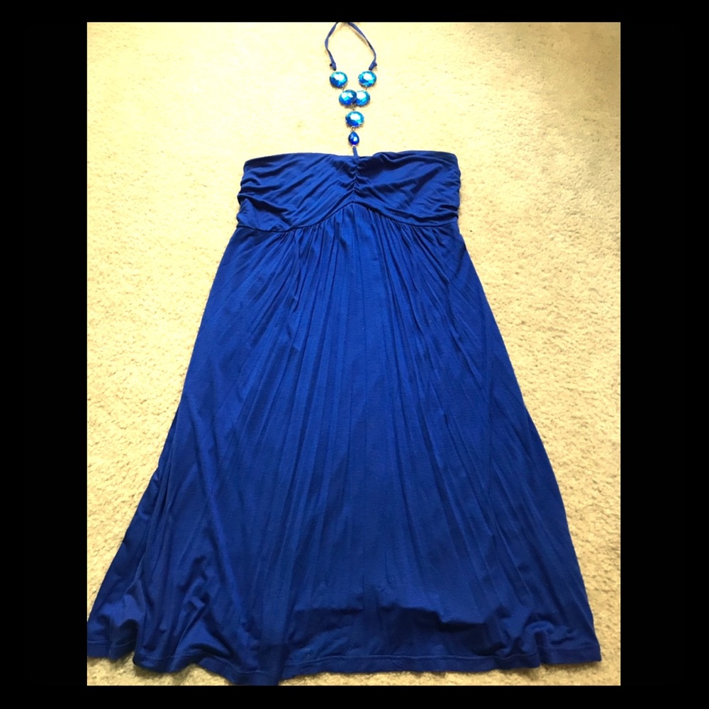 Blue kneelength halter dress w/ jewels on neckline